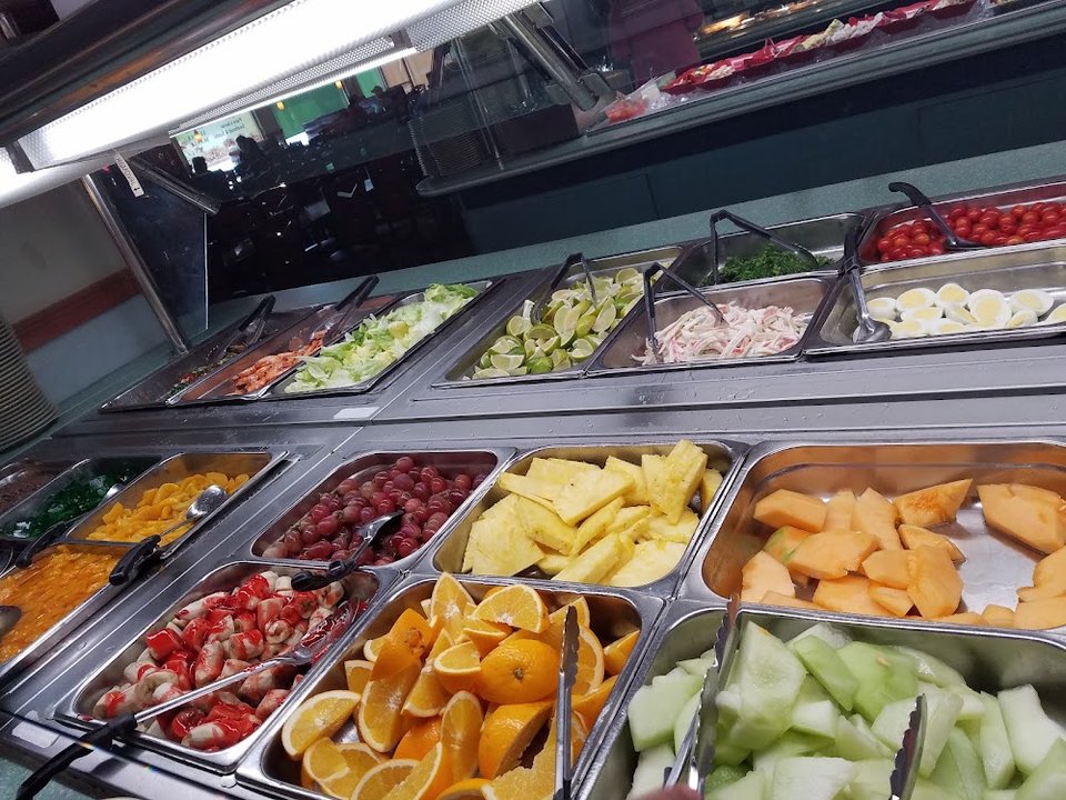 Vegetarian options arranged across a buffet spread.